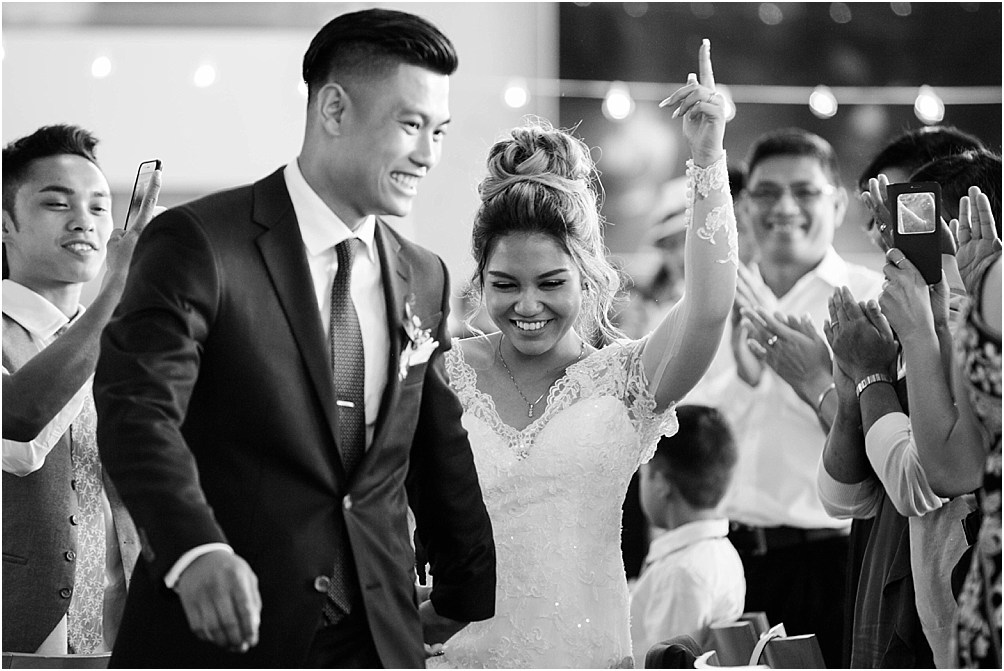 A bride and groom enter into their ceremony