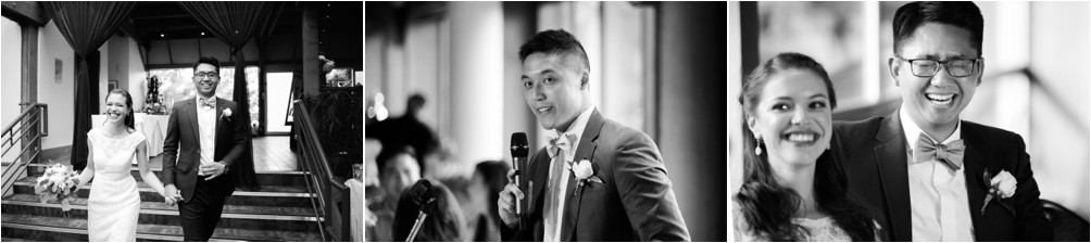 A bride and groom share a laugh while a groomsmen gives a speech at the Diamond Alumni Centre at Simon Fraser University by Clint Bargen Photography.
